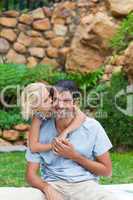 Father giving daughter piggyback