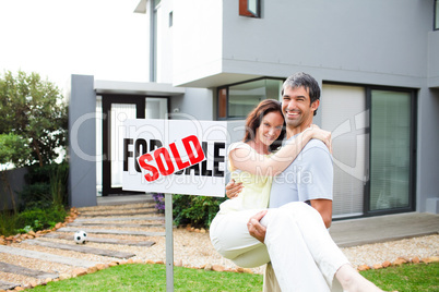 Couple celebrating their new house