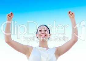 Young businesswoman outdoors against blue sky