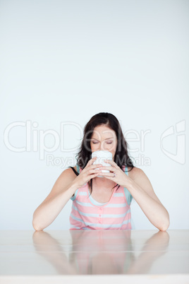 Woman having a cup of coffee