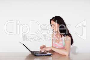 Attractive woman using her laptop