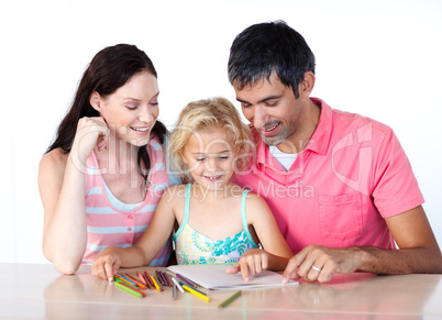 Father and mother drawing with her daughter