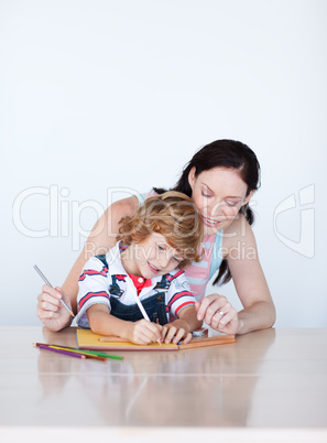 Mother and son doing homework with copy-space