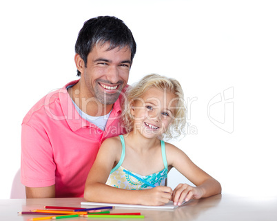 Daughter and father drawing looking at the camera