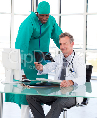 Professional doctors looking at an X-ray