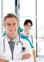 Smiling doctor in a row