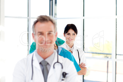 Confident young female doctor smiling at the camera
