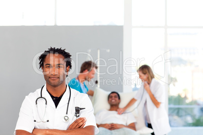 Serious doctor looking at the camera with copy-space