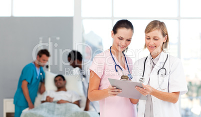 Group of doctors attending to a patient