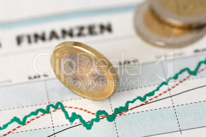 Kurs-Chart mit Euro-Münzen