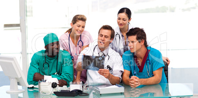 Group of doctors examining an X-ray