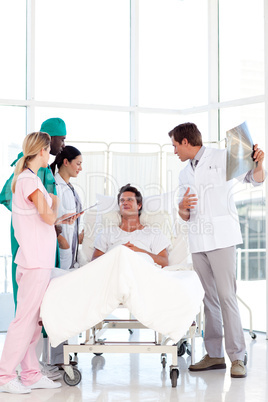 Doctors speaking to a patient