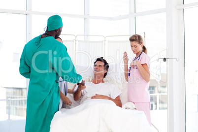 African-American surgeon greeting his patient