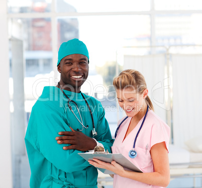 Surgeon and nurse in hospital