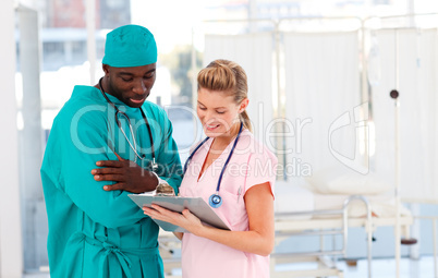 Surgeon and nurse working together