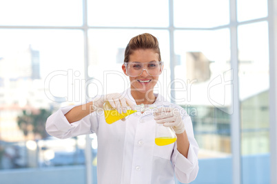 Attractive scientist working with a test-tube