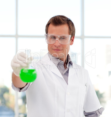 Young scientist examining a test-tube
