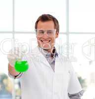 Scientist examining a test-tube