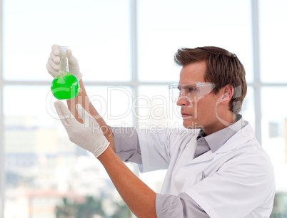 Scientist examining a test-tube