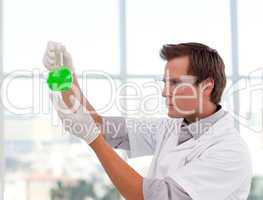 Scientist examining a test-tube