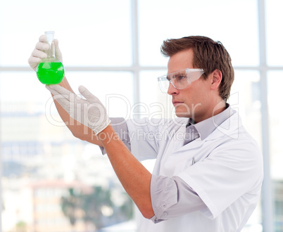 Science student examining a test-tube