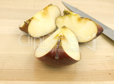 Sliced apple with knife