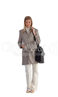 Attractive businesswoman with Travel bag