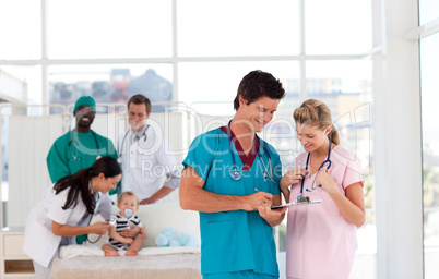 Doctors in a hospital looking after a patient