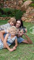 Potrait of a young family in the garden