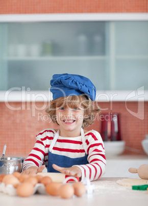 young boy cooking