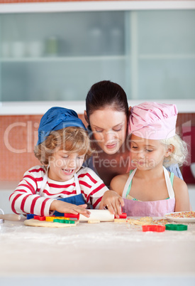 Mother Interacting with Children in Kitchen