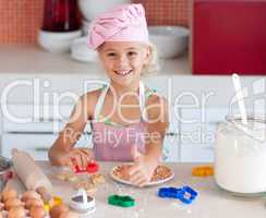 Beautiful young Girl Working in the Kitchen