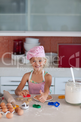 Beautiful young Girl Working in the Kitchen