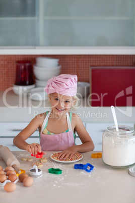 Beautiful young Girl Working in the Kitchen