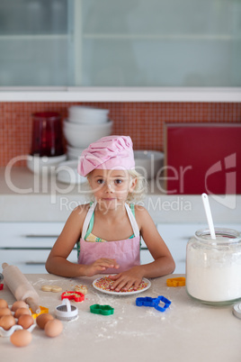 Beautiful young Girl Working in the Kitchen