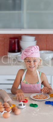 Beautiful young Girl Working in the Kitchen