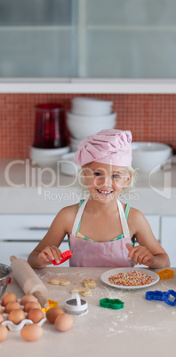 Beautiful young Girl Working in the Kitchen