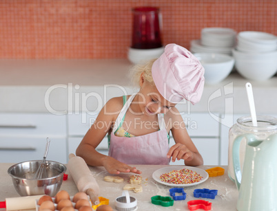 Beautiful young Girl Working in the Kitchen