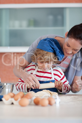 Mother and child doing Christmas baking