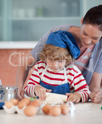 Mother and child doing Christmas baking