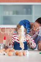 Mother and child doing Christmas baking