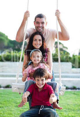 Family on a swing