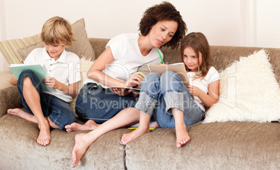 Family relaxing on sofa