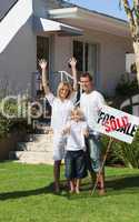 Family in front of House for sale