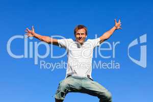 Man having fun by jumping in the air