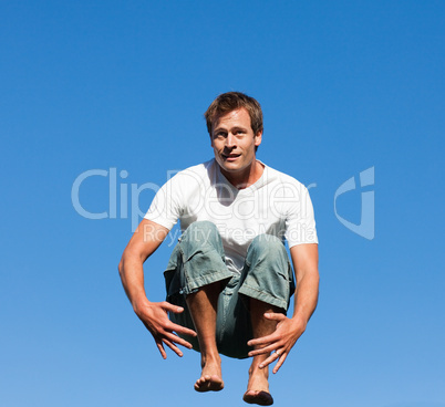 Man jumping in mid air