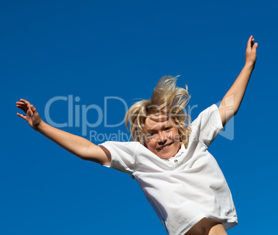 Boy Jumping on a trampoline