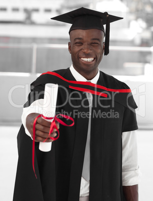 Man smilling at graduation