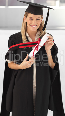 Woman smiling at her graduation