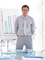 Business teacher standing before class